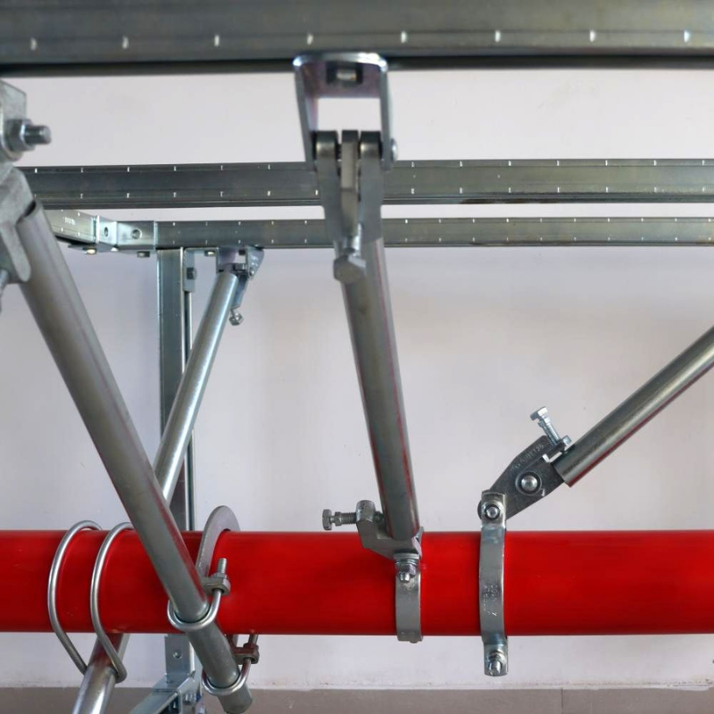 Close-up of seismic bracing components for pipe support systems